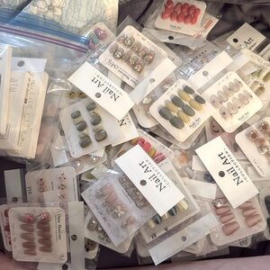 50+ pairs of press on nails